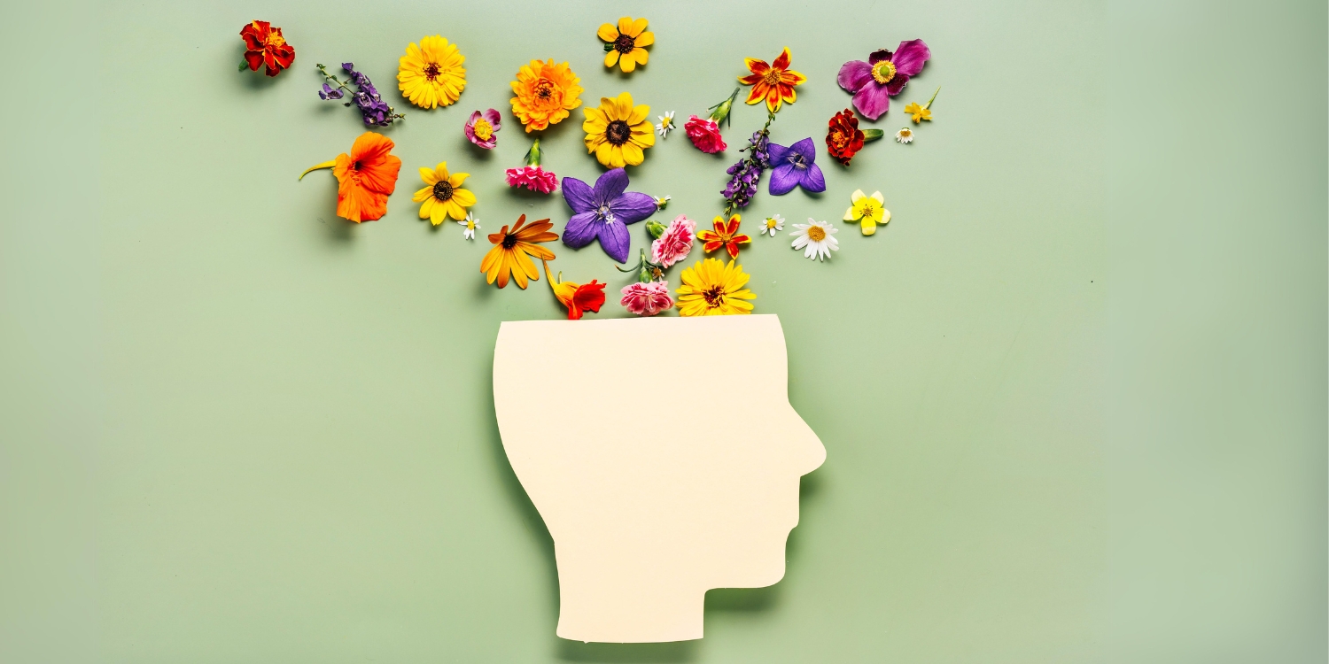 flowers coming out of a head