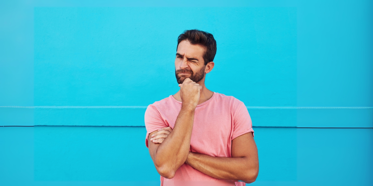 curious man with hand on chin